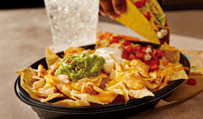 Taco Bell Cantina Boise signature dishes Crunchwrap SupremeNachos BellGrandeTwisted Freeze with TequilaBeer and Wine
